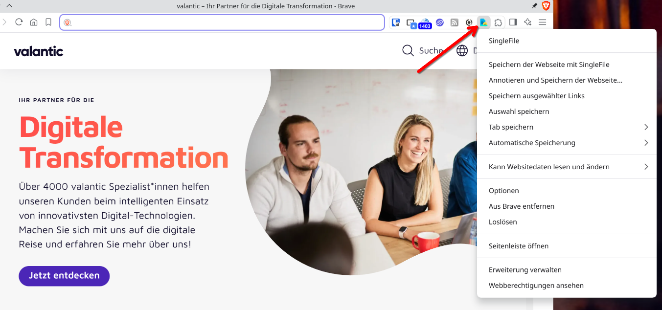 The valantic website has a modern appearance with the title “Digital Transformation.” Two people, a woman with long blonde hair and a man with dark hair, are in a meeting room, smiling while sitting at a table. An open menu tab with various options is also visible on the page.